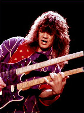 Edward playing his double-neck Ernie Ball Music Man