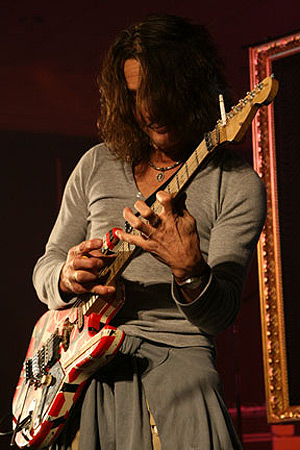 Edward playing his baby