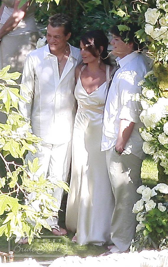 Eddie's 18-year-old son Wolfgang served as best man and both father and son dressed casually in Sy Devore cotton pants