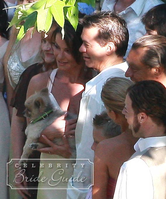 Janie's pomeranian Kano walked her down the aisle and posed with her for wedding pictures